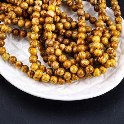 حبات الخشب الصفراء حبة مستديرة حبة كريستالية طبيعية حجر كريم خشب الياسبر حبات فضفاضة للجواهر